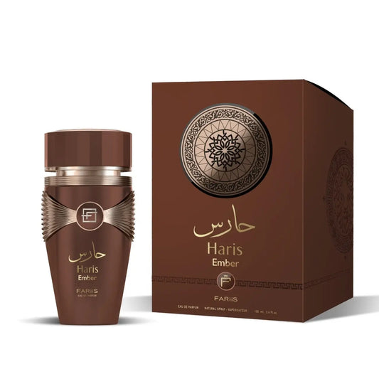 Bruin glazen parfumfles met gouden accenten en zilveren band gelabeld haris ember by fariis voor haris ember edp
