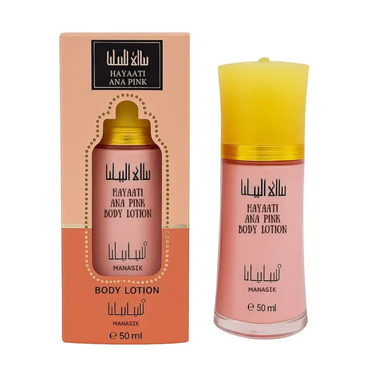 Roze glazen fles hayaati ana pink body lotion met gele dop en gouden band van het merk manasik