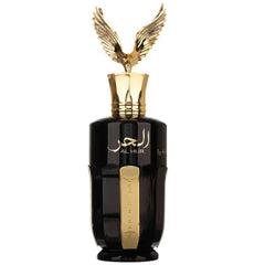 Zwarte glazen parfumfles al hur so intense met gouden accenten en gouden arendvormige dop met arabische tekst