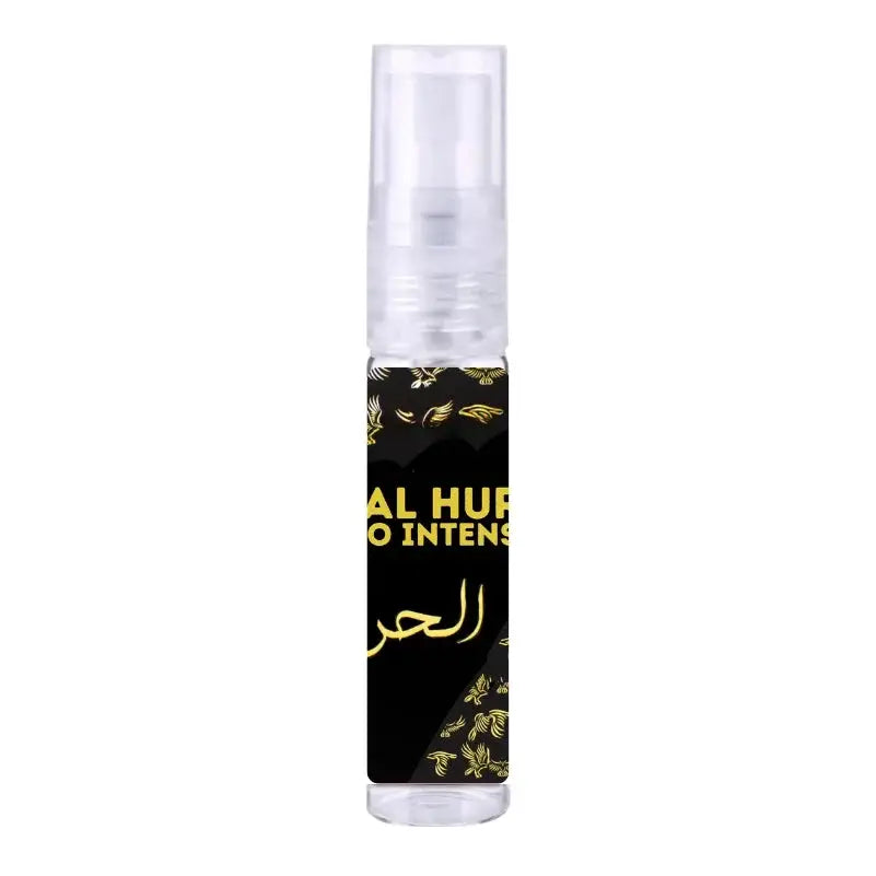 Een elegante zwarte en gouden parfumfles Al Hur So Intense met transparante dop en gouden vleugelmotieven