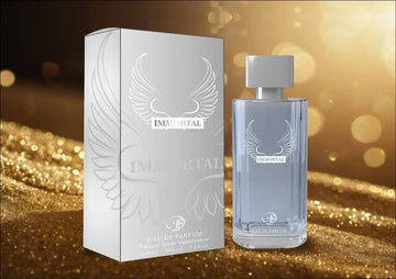 Immortal edp zilvergevleugelde eau de parfumfles met slank transparant glasontwerp en zilverkleurige dop