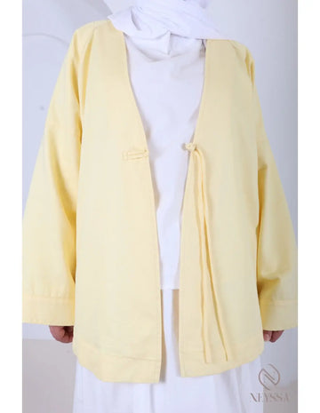 Jasje kimono stijl zachte gele losvallende cardigan met striksluiting en subtiele stikdetails