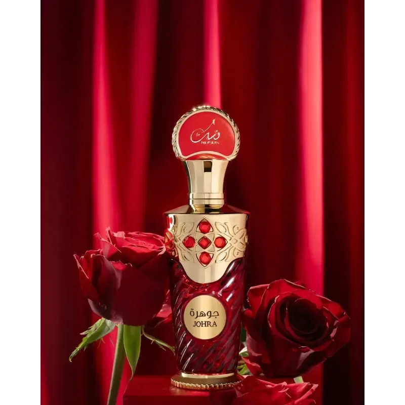 Een luxueuze rode en gouden johra edp 100 ml parfumfles met gebeeldhouwde patronen en robijnrode accenten