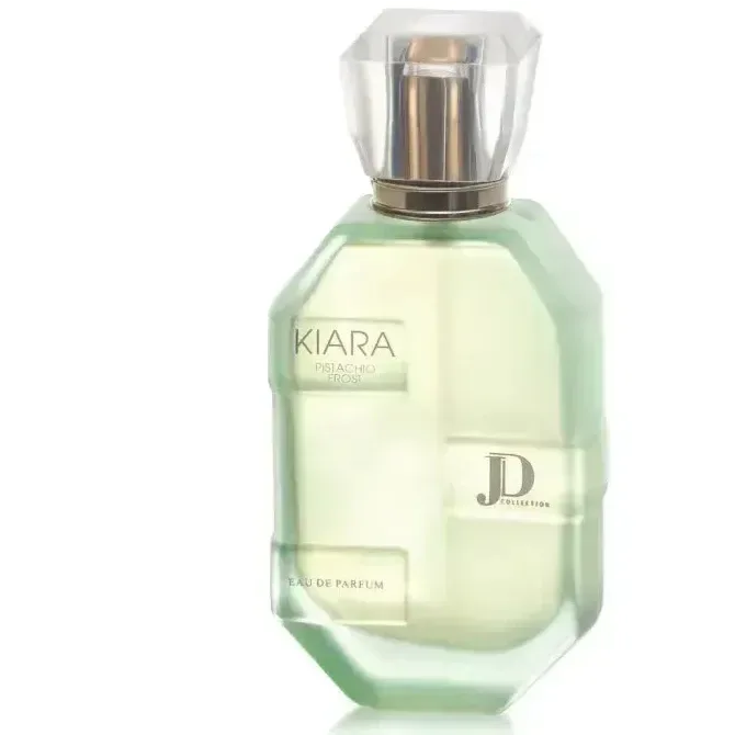 Een elegant lichtgroen glazen parfumflesje kiara pistachio frost edp met een geslepen kristallen dop en goudkleurige accenten