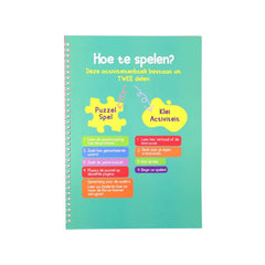 Turquoise spiral workbook met Hoe te spelen en kleurrijke puzzelstukjes voor Kleine Moslim Activiteitenboek