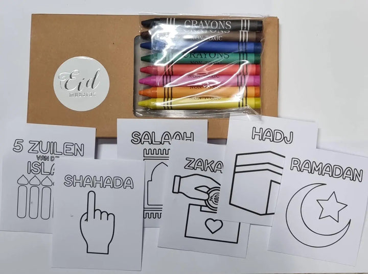A set of colorful non-toxic crayons in a clear plastic sleeve inside a brown cardboard box with an eid sticker