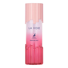 Een elegant roze gradient bodymistflesje met geribbelde glazen ontwerp en bijpassende dop van maison alhambra