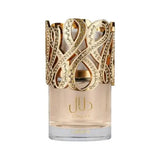 Een goudkleurige kroonvormige dop siert een doorzichtige glazen parfumfles met jud en dalai tekst voor lattafa dalal eau de parfum