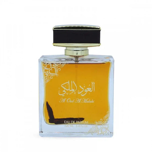 Een vierkante glazen parfumfles met een zwarte en gouden dop gevuld met amberkleurige eau de parfum al oud al malaki van Lattafa Jawaher Crystal Oud