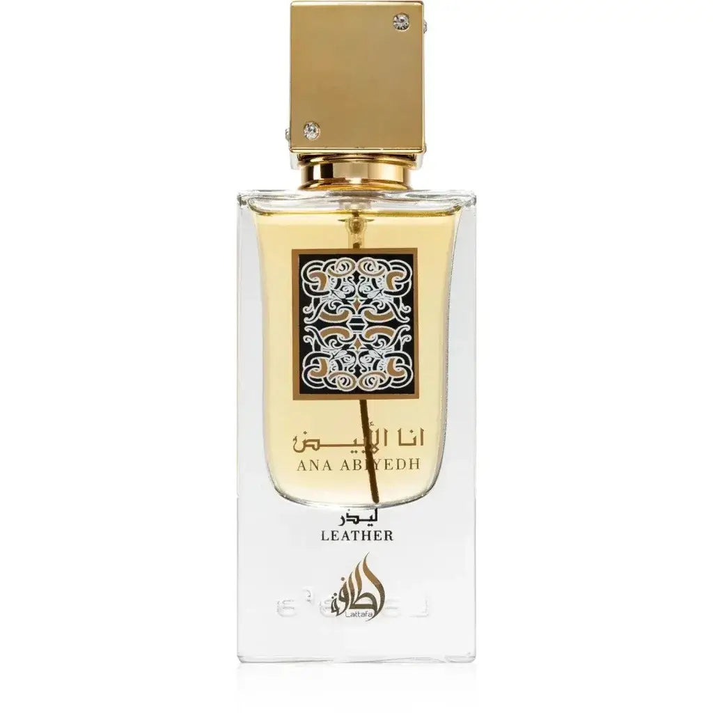 Een rechthoekige glazen parfumfles lattafa parfum ana abiyedh leather met gouden dop en arabische kalligrafielabel