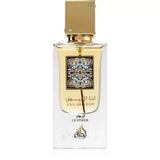 Een rechthoekige glazen parfumfles lattafa parfum ana abiyedh leather met gouden dop en arabische kalligrafielabel
