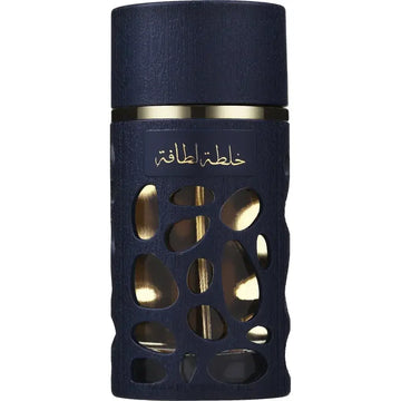 Donkerblauw lattafa parfum blend flesje met goudfolie accenten en gedetailleerd uitgesneden patroon