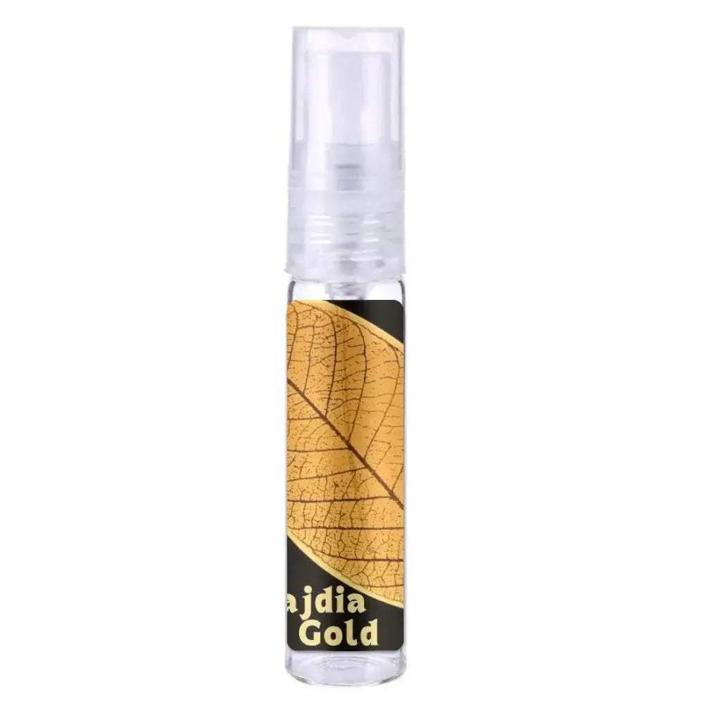 Heldere plastic sprayfles met gouden bladontwerp en tekst ajdia gold van lattafa parfum najdia gold product