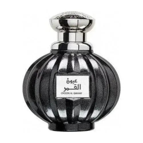 Zwart geribbeld glazen parfumflesje met zilveren dop en label arabisch oud al qamar van Lattafa Parfum