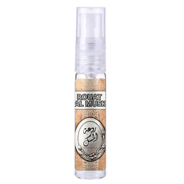 Lattafa parfum rouat al musk clear glass spray bottle with silver and gold ornate label in english and arabic