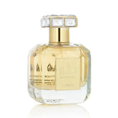 Lattafa parfum sutoor een luxe parfumfles met gouden accenten en een facetten kristallen dop met arabische tekst