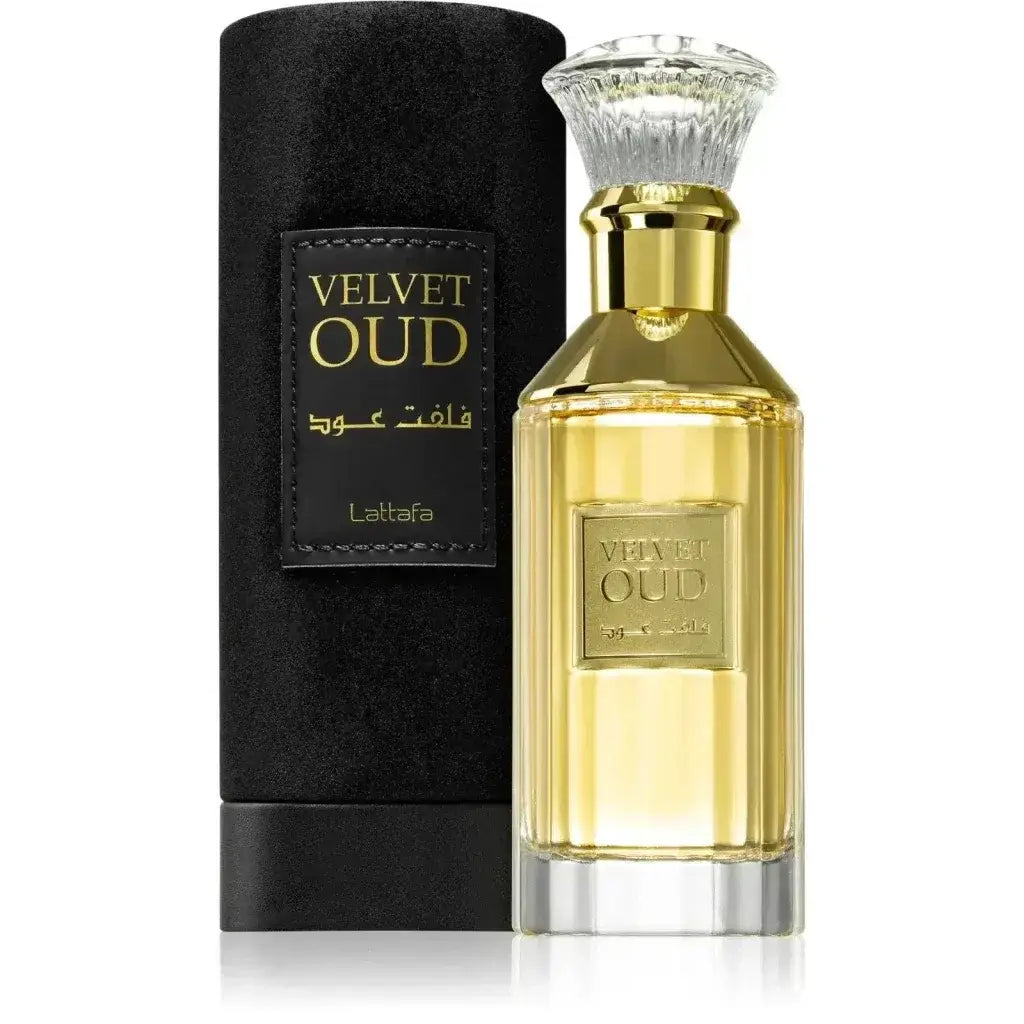 Gouden rechthoekige parfumfles met facetten kristalstop en gouden dop labeled velvet oud van lattafa