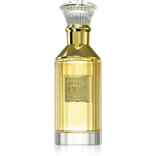 Een luxe goudkleurige parfumfles met een gefacetteerde kristallen dop en een geletterd vivyet oud-label van lattafa parfum velvet oud