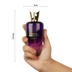 L’femme Paradiso parfumfles met roze en paarse ombre en gouden dop in hand
