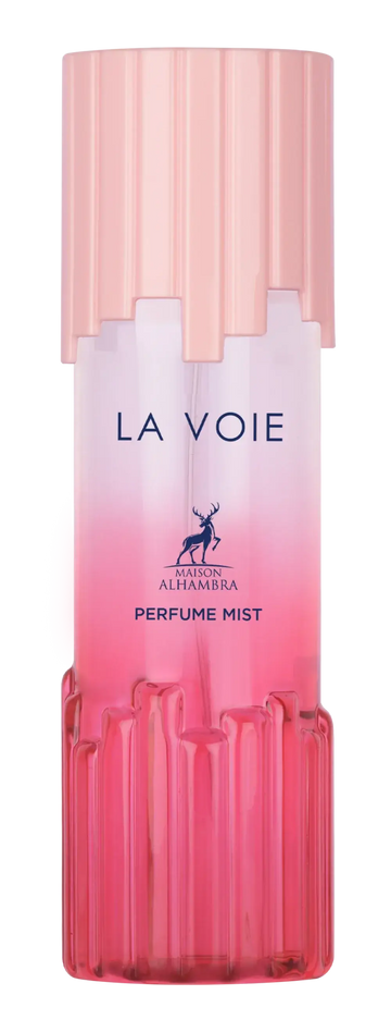 Een elegante roze gradient body mist fles met geribbeld glas en dop van maison alhamra genaamd la voie body mist