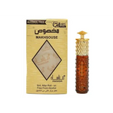 Gold-toned textured glass perfume bottle makhsouse with diamond-patterned cap and amber-colored liquid inside