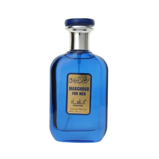 Een levendige blauwe glazen fles manasik marghoub voor heren eau de parfum met zilveren dop en gouden etiket