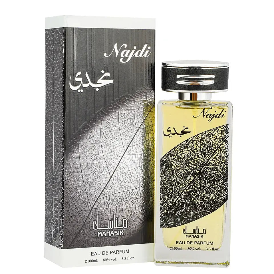 Een strakke rechthoekige glazen fles manasik najdi eau de parfum met zwart zilver bladpatroon en gouden vloeistof