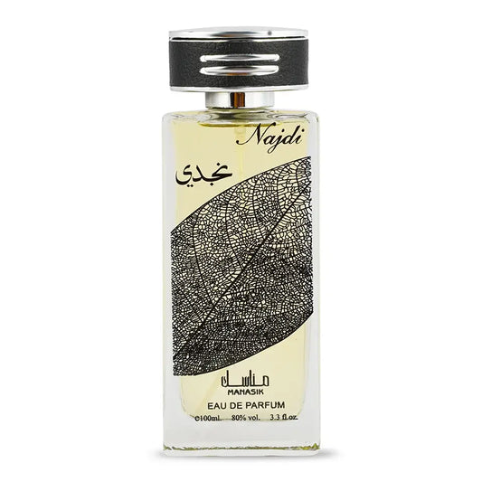 Een rechthoekige glazen fles najdi eau de parfum van manasik met zwart zilveren dop en bladpatroon