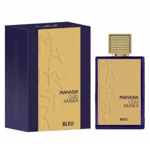 Manasik oud amber blue parfum in een rechthoekige goudblauwe fles met een sierlijke gouden dop naast luxe verpakking