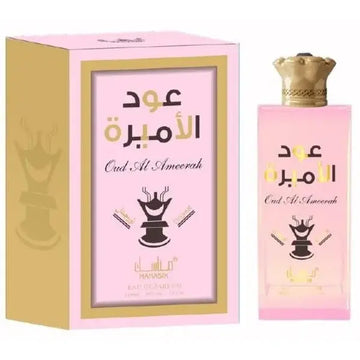 Roze rechthoekige parfumfles met gouden kroonvormige dop en bijpassende doos met arabische tekst manasik oud al ameerah