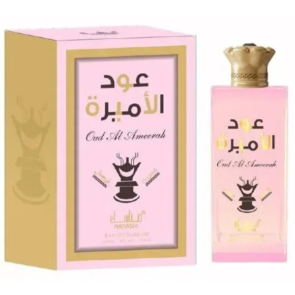 Roze rechthoekige parfumfles met gouden kroonvormige dop en bijpassende doos met arabische tekst manasik oud al ameerah