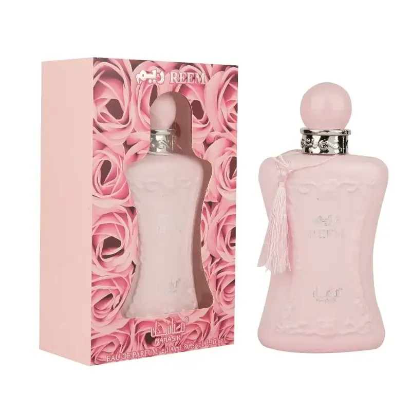 Pink matte-finish parfumflesje manasik reem met zilveren dop en tassel in vrouwensilhouetvorm