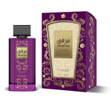 Purple murfaq eau de parfum bottle with gold ornate detailing and black cap beside matching purple and gold box
