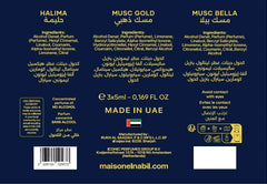 Donkerblauwe parfumfles label met gouden tekst van halima musc gold en musc bella in musc collection giftset el-nabil
