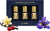 Drie elegante goudkleurige parfumflessen met deksels in een marineblauwe doos van maison el nabil musc collection giftset