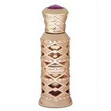 Goudkleurige parfumfles musk al haramain parfumolie met ingewikkeld rasterontwerp en paarse edelsteen dop