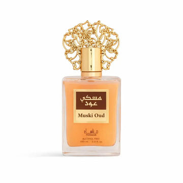 A rechthoekige glazen fles muski oud alcoholvrije parfum van pamaasik met een gouden decoratieve dop en amberkleurige vloeistof