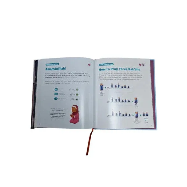 Open instructieboek my first salah book met arabische tekst en roze cartoonfiguur over bidden uitleg en diagrammen