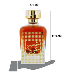 Amber gekleurde parfumfles met gouden accenten voor Nusuk Parfum Amber Oud