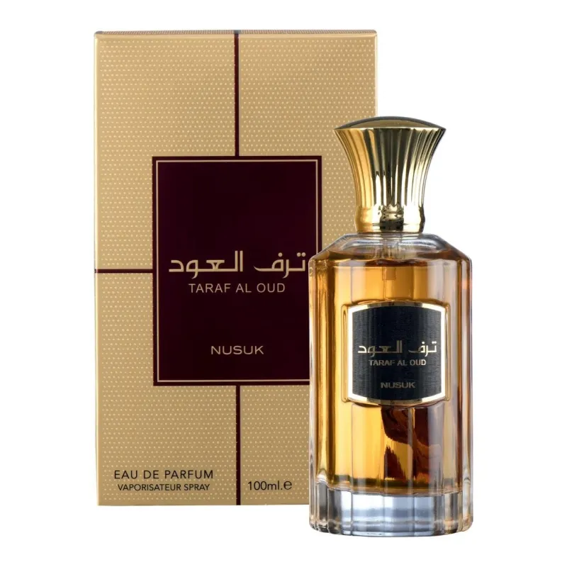 Gold-tonen parfum bottle en doos van Nusuk Parfum Taraf voor een luxe geurervaring