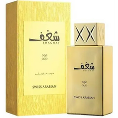 Goldkleurige parfum spray fles en doos van Shaghaf Oud Swiss Arabian