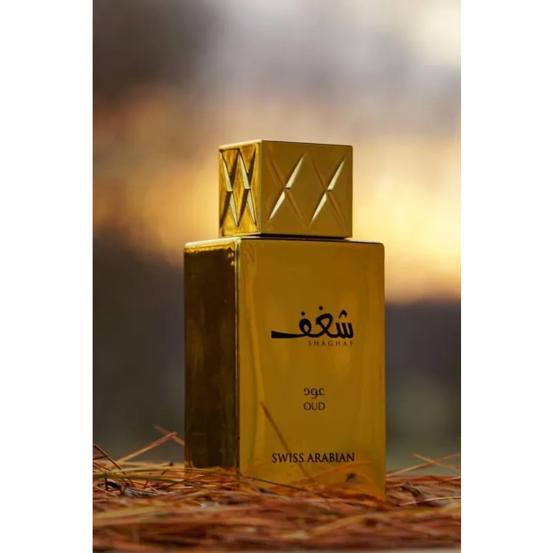 Goldkleurige parfum spray fles met textuurkap voor Shaghaf Oud van Swiss Arabian