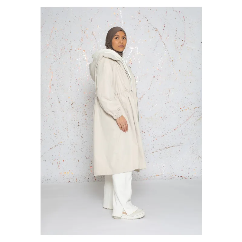 Parka jas: crèmekleurige lange jas met capuchon en zakken