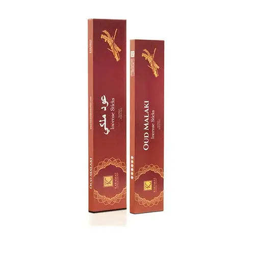 Twee rechthoekige dozen met maroon en gouden details van premium oudh malaki wierookstokjes uit de karamat collectie musk