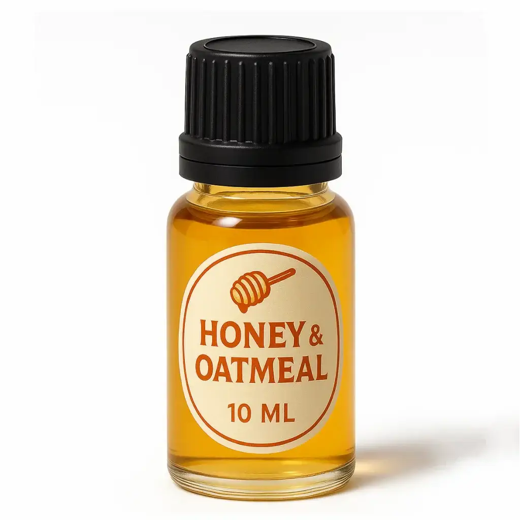 Een heldere glazen fles met zwarte ribbelde dop gevuld met honingkleurige pure geurolie honey en oatmeal 10 ml