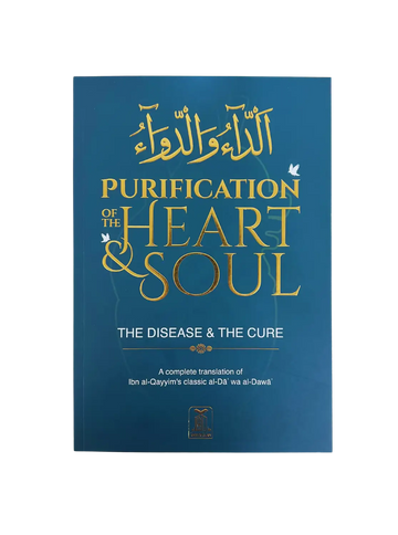 Blauw hard cover boek met gouden letters en witte vogelmotieven getiteld purification of the heart and soul illness and cure
