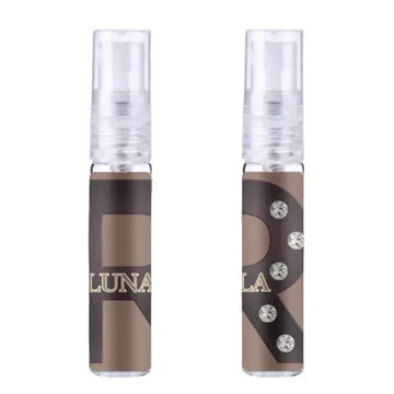 Twee transparante sprayflessen r stella en luna edp 50 ml met bruine en zwarte labels en zilveren strasstenen met merknaam luna in goud