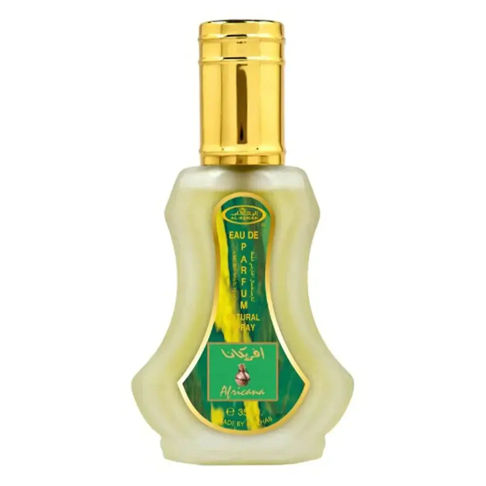 Een slanke halfdoorzichtige groene glazen parfumfles van al-rehab parfum africana met gouden dop en arabische tekst