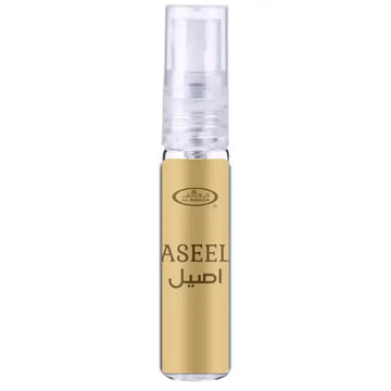 Goudkleurige glazen parfumfles al-rehab parfum aseel met transparante spray en zwarte arabische letters