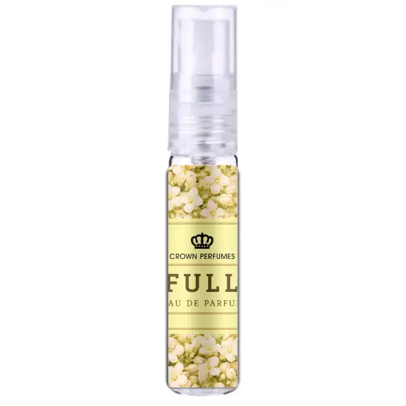 Een heldere glazen sprayfles met transparante dop en een lichtgele label met witte bloemen en crown perfumes branding al-rehab parfum full